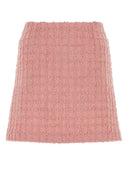 Gonna versace rosa boucle