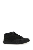 Tessuto nero Givenchy e sneaker in pelle