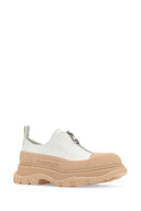 Alexander McQueen Zwei -Ton -Leinwand treten Slick -Turnschuhe