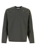 سترة من النايلون المطاطي باللون الرمادي الداكن من Stone Island