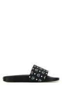 Schwarze Gummipantoffeln von Mcm