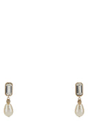 Orecchini Alexander Mcqueen con teschio in metallo dorato