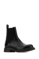 Schwarze Gucci-Lederstiefeletten