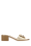 Muli Baguette in pelle dorata Fendi