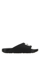 Chaussons en caoutchouc noir Givenchy