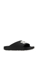 Chaussons en caoutchouc noir Givenchy