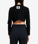 Un bambino di carta maglioni neri