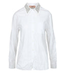 N ° 21 camisas blancas