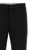 Alexander McQueen steckte Abendhosen ein