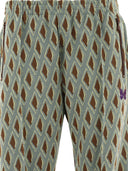 I pantaloni di binari degli aghi