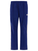 I pantaloni di binari degli aghi