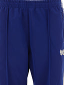 I pantaloni di binari degli aghi