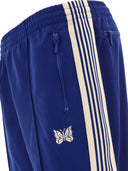 I pantaloni di binari degli aghi