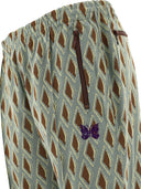 I pantaloni di binari degli aghi