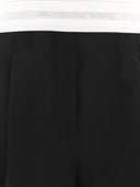 Alexander Wang Shorts a pieghe ad alta vita con logo elastico