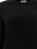 Alaïa Fringed Sleeve Knit Sweater