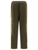 Pantalon de piste fabriqué humain
