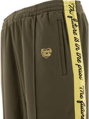 Pantalon de piste fabriqué humain
