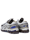 Baskets Asics et glisser