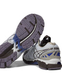Baskets Asics et glisser