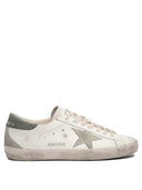 Sneakers Golden Goose et glissade