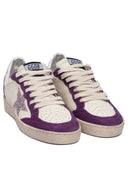 Sneakers Golden Goose et glissade