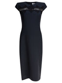 Alexander McQueen si veste