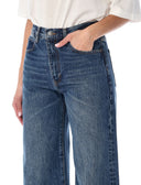 Jeans con cornice
