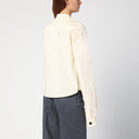 La camisa de chipre de color de vainilla