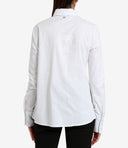 Aniye por camisas blancas