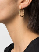 Pendientes de plata reciclados con obras completadas