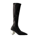 Botas circulares Courreges de cuero sintético negro