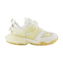 Volg heldere enige sneakers in witte crème