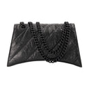 Chaîne d'écrasement S Hobo sac Balenciaga en cuir noir