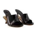 Les raddoppia i muli sandali jacquemus in pelle nera