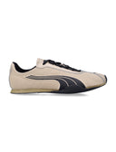 Scarpe da ginnastica Puma dorate