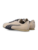 Scarpe da ginnastica Puma dorate