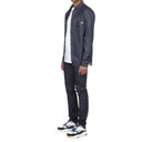 Jeans logo di Dior Homme X Kaws