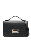 Victoria Beckham poser .. svart