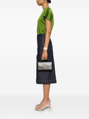 Victoria Beckham poser .. svart