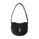 Petit sac à cheval à bascule burberry en cuir noir
