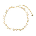 Collar de arcos de cristal autorretrato oro