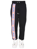 GCDS Jogging Pants z „uroczą taśmą” opaską logo