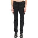 Comme des garcons pantalones delgados