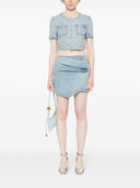 Autorretrato azul adornado con adorno de mezclilla