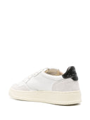 Autry -Medaillengewinner niedriger WOM Ziegen/Wildleder wht/blk
