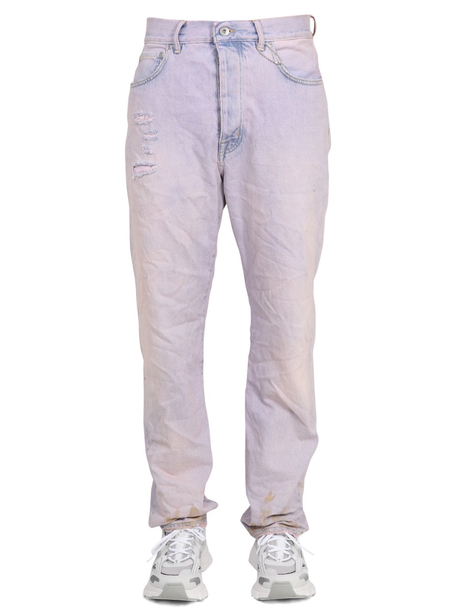 Jeans di marca viola in denim