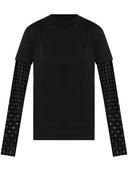 Effetto sovrapposto alla maglietta Givenchy