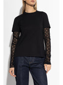 Effetto sovrapposto alla maglietta Givenchy