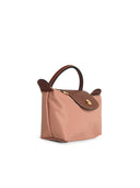 Bolsa de embrague Longchamp con mango 'Le Pliage original' en poliamida rosa